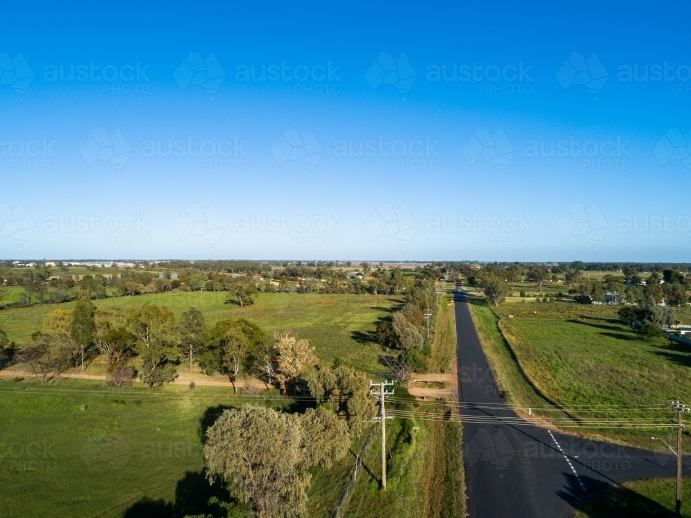 Aerial view of intersection of rural roads heading out into country - Australian Stock Image