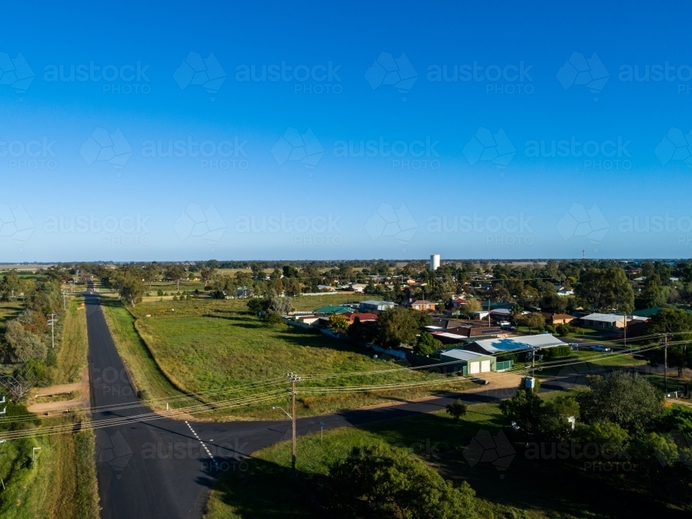 Aerial view of intersection of rural roads heading out into country - Australian Stock Image