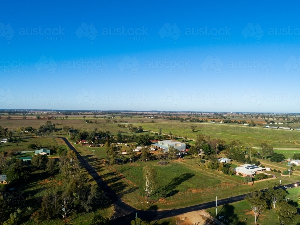Aerial view of intersection of rural roads heading out into country - Australian Stock Image