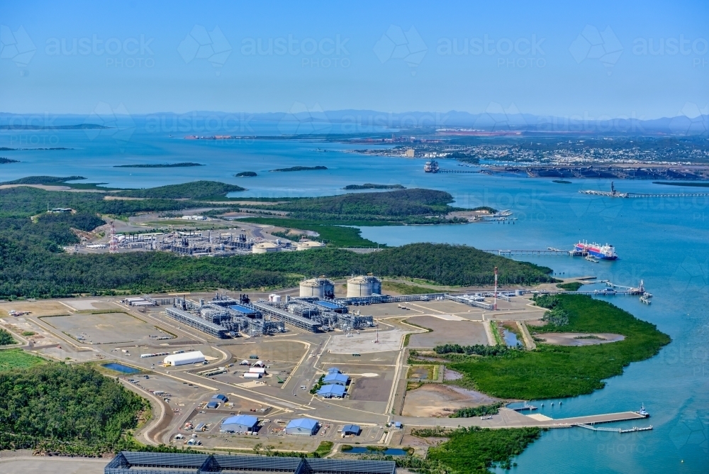 Aerial view of liquified natural gas plant and LNG ship on Curtis Island, Queensland - Australian Stock Image