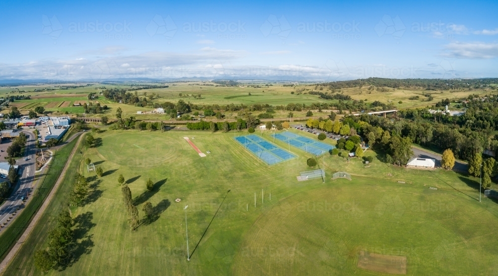 Aerial view of long jump track and pit at Cook Park  beside netball courts and sports field - Australian Stock Image