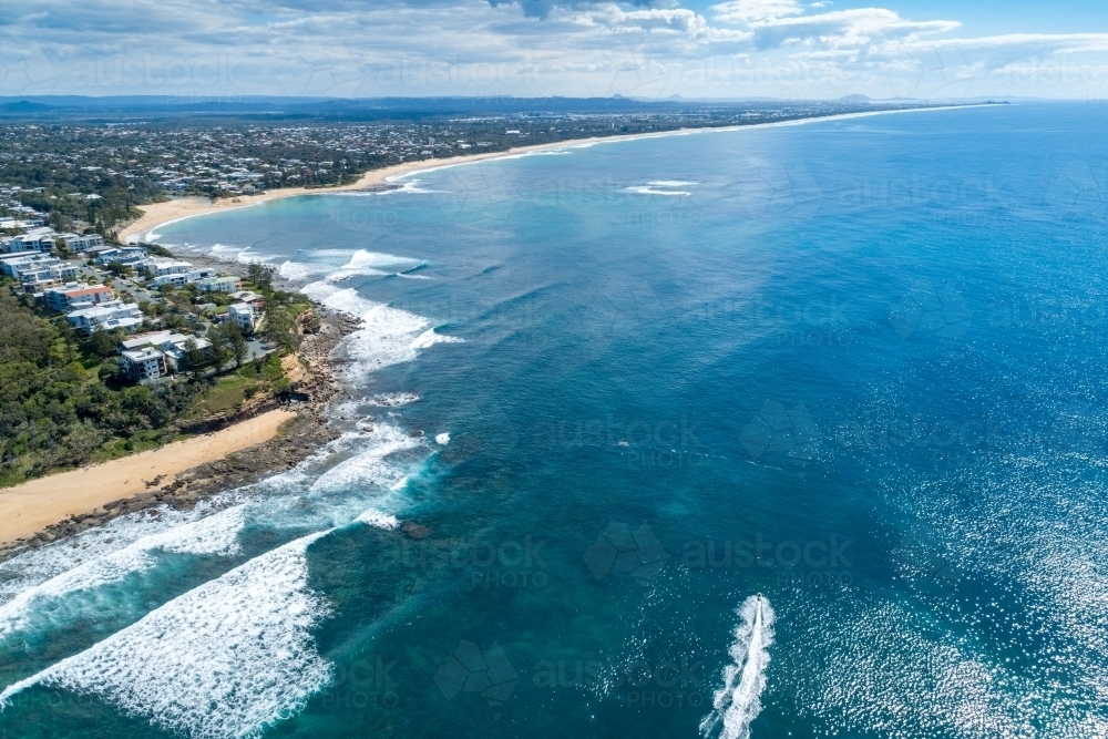 Aerial view of Moffat Beach and northern coastline. - Australian Stock Image