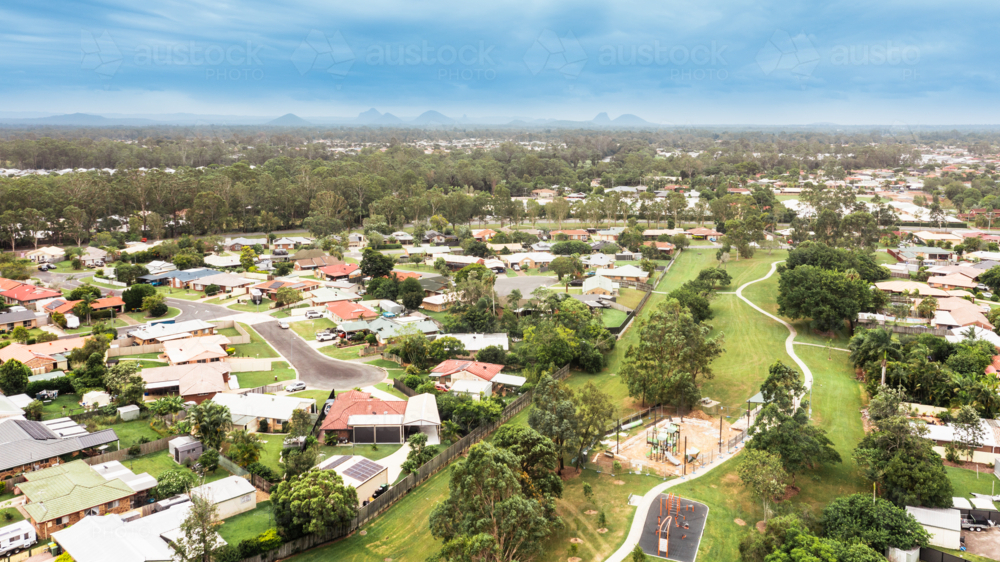 aerial view of Moreton Bay suburbs looking towards the Glasshouse Mountains - Australian Stock Image
