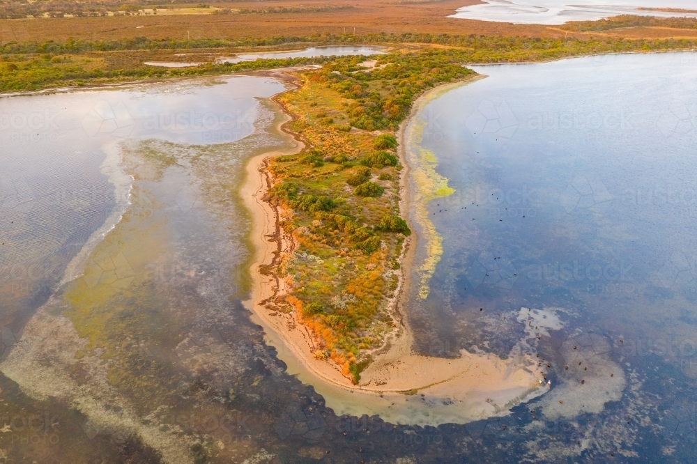 Image of Aerial view of narrow peninsula in a coastal lagoon Austockphoto