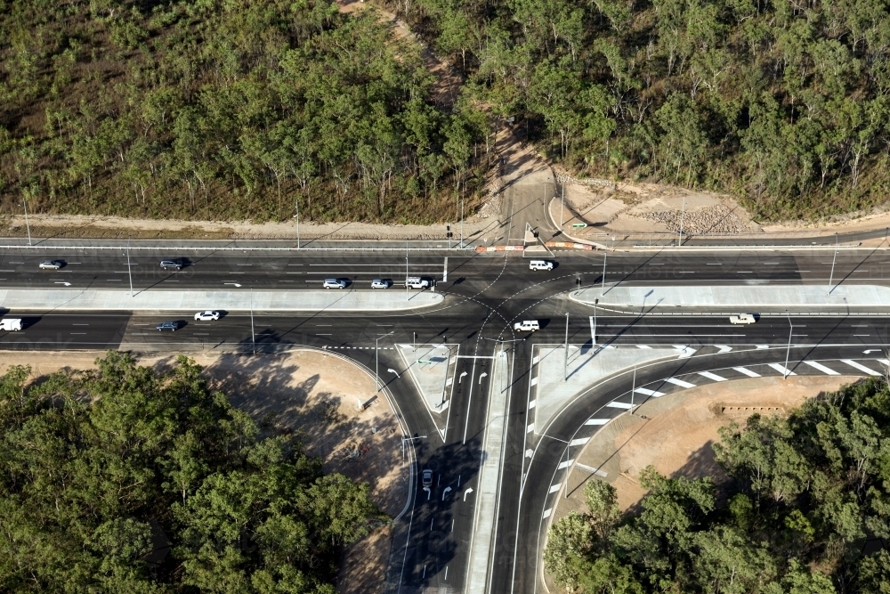 Aerial view of new roads surrounded by bushland - Australian Stock Image
