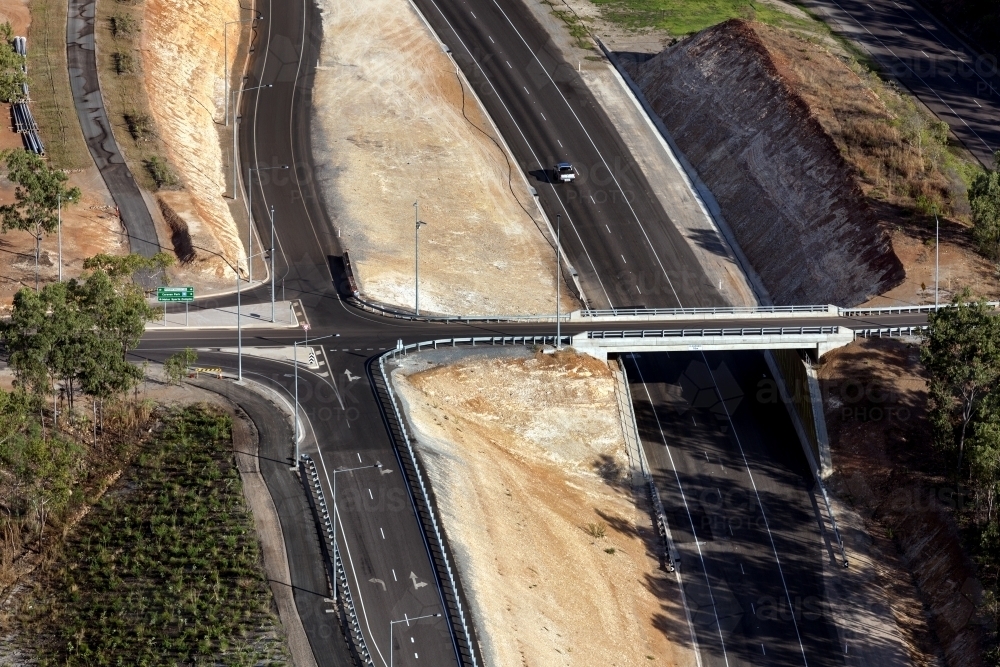 Aerial view of new roads surrounded by bushland - Australian Stock Image