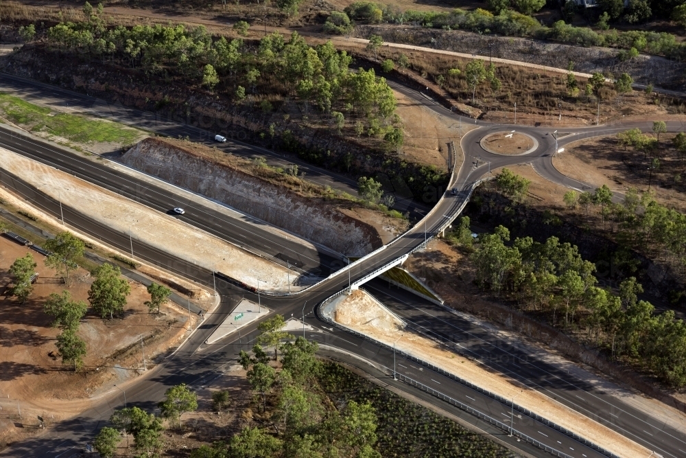 Aerial view of new roads surrounded by bushland - Australian Stock Image