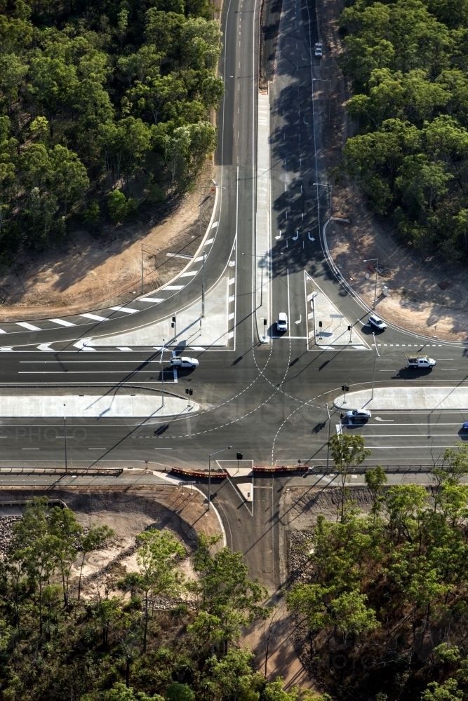 Aerial view of new roads surrounded by bushland - Australian Stock Image
