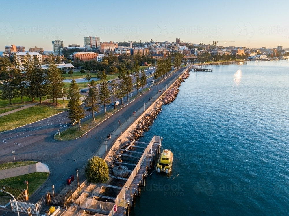 Aerial view of Newcastle Foreshore Footpath at sunset - Australian Stock Image
