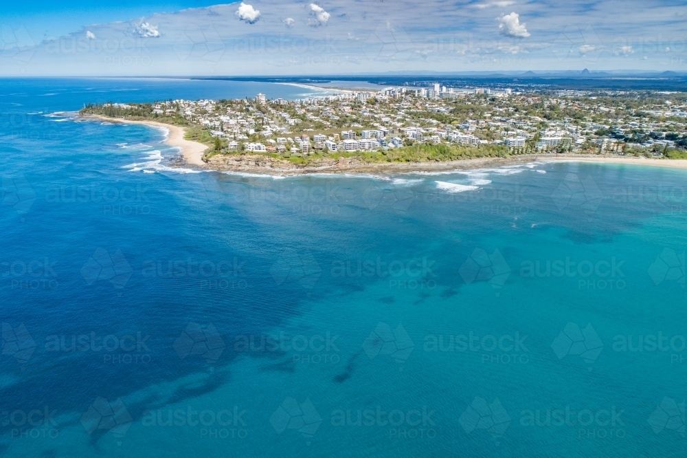 Aerial view of ocean and Moffat Beach. - Australian Stock Image