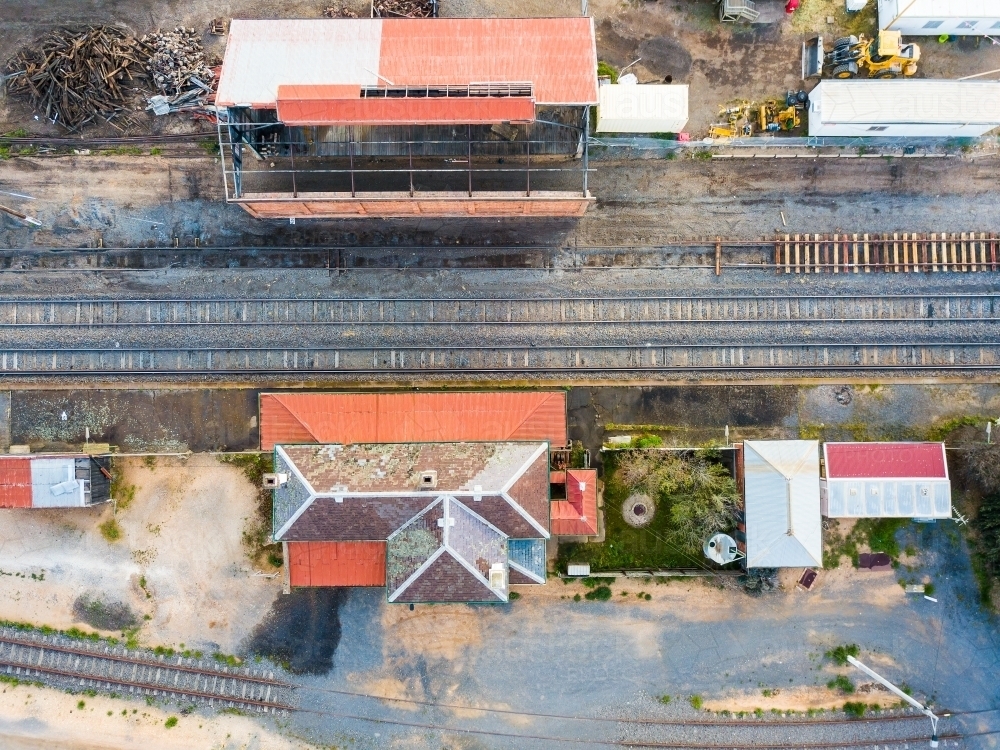 Aerial view of of a country railway station and surrounding sheds - Australian Stock Image