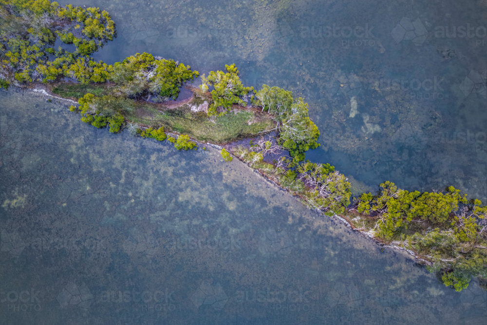 Aerial view of Ohmas Bay in Tuncurry, capturing its calm turquoise waters - Australian Stock Image