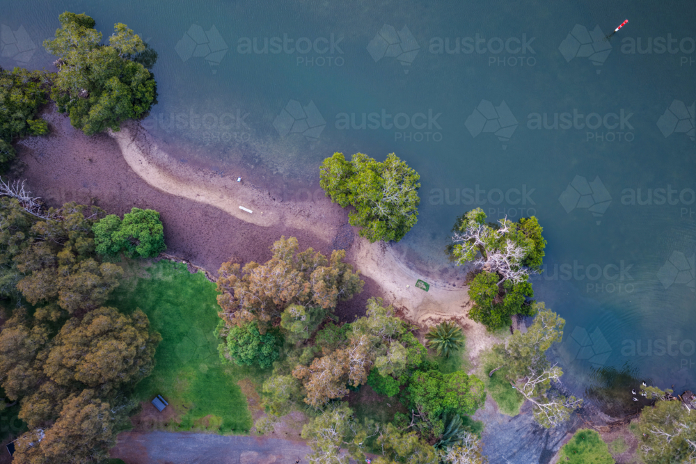 Aerial view of Ohmas Bay in Tuncurry, capturing its calm turquoise waters - Australian Stock Image