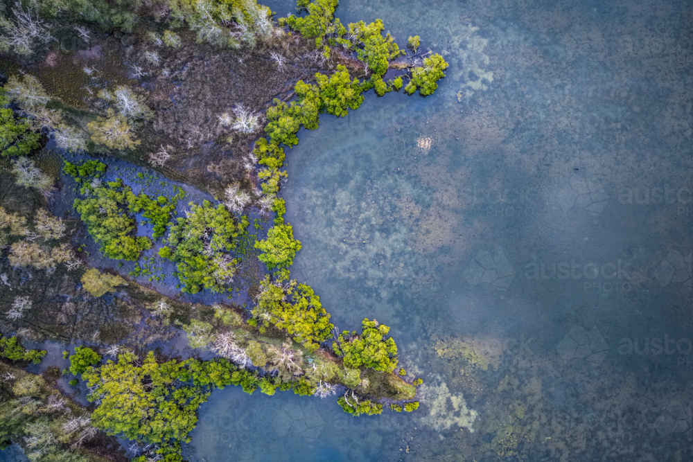 Aerial view of Ohmas Bay in Tuncurry, capturing its calm turquoise waters - Australian Stock Image