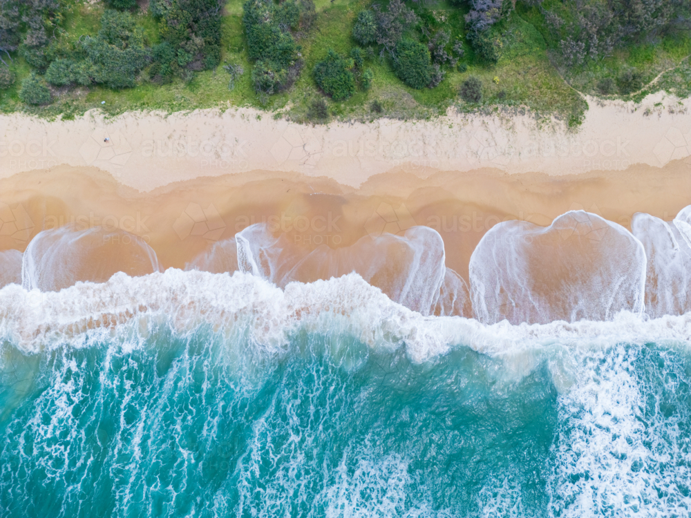Aerial view of patterns on a sandy beach - Australian Stock Image