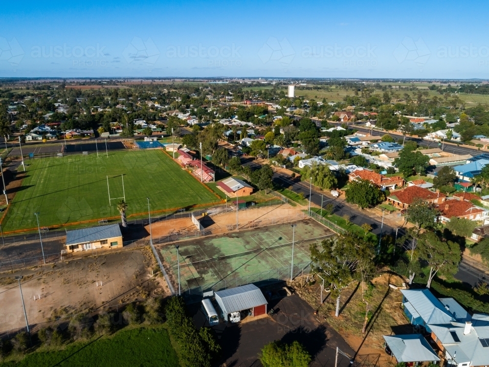Aerial view of playing field and courts in rural country town - Australian Stock Image