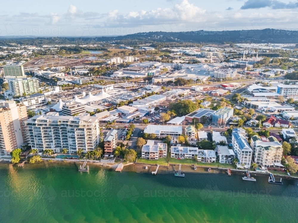 Aerial view of real estate along the banks of the Maroochy River in Queensland. - Australian Stock Image