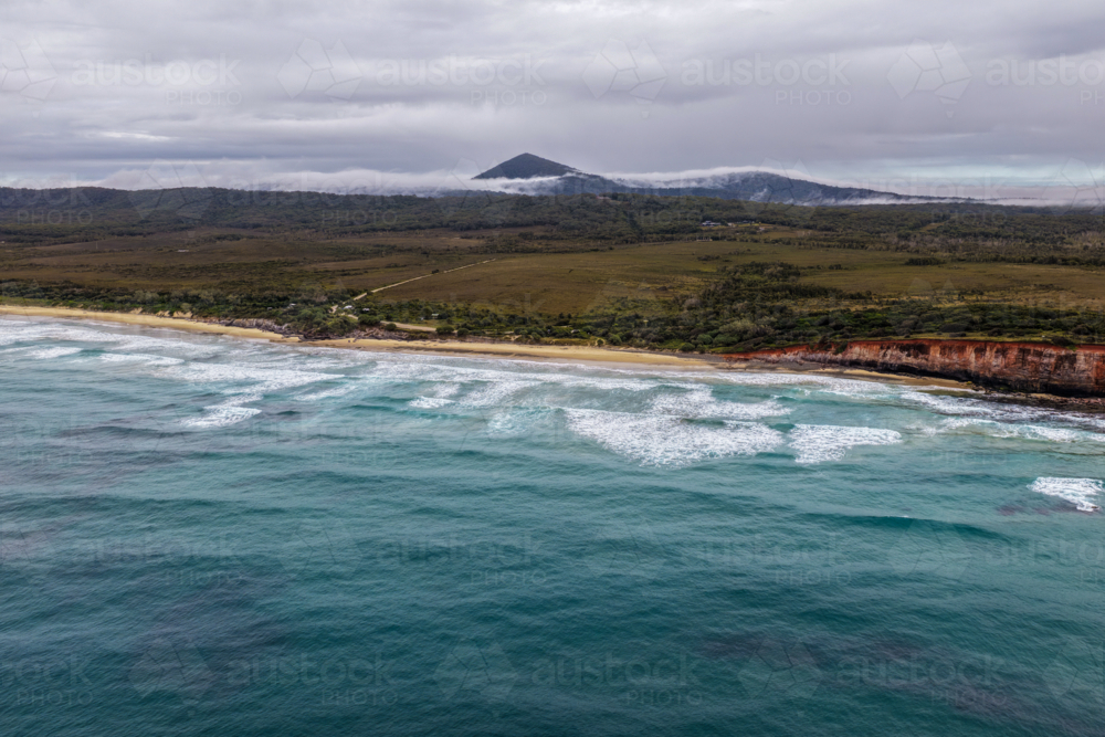 Aerial view of Red Cliff Campground and the surrounding coastal landscape - Australian Stock Image