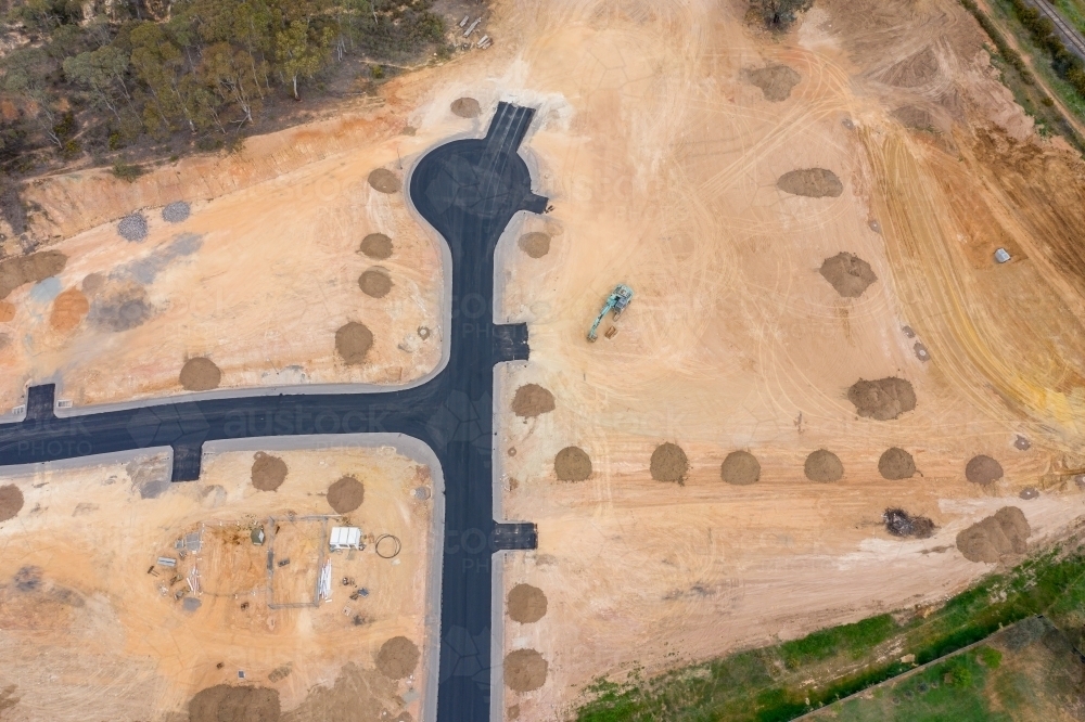 Aerial view of roads and house blocks in a new housing subdivision - Australian Stock Image