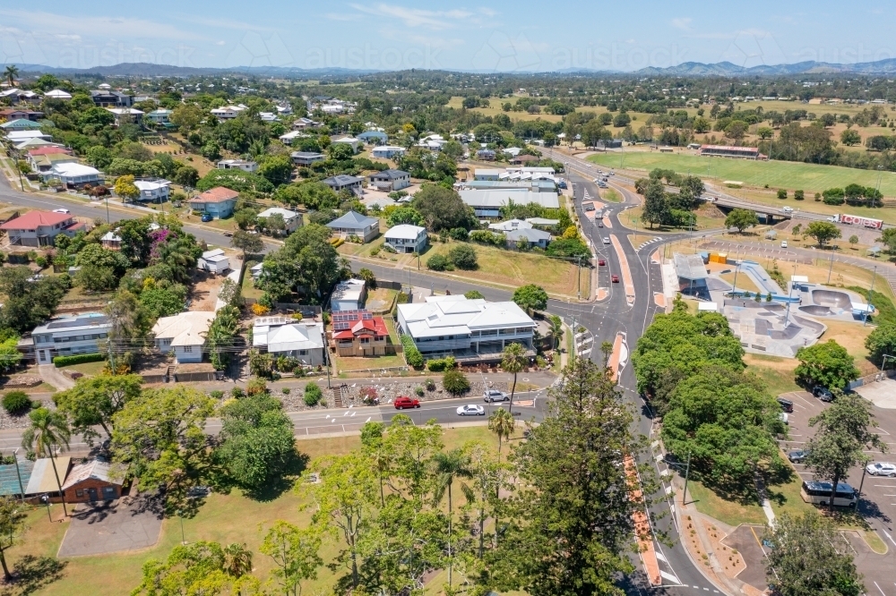 Aerial view of roads and housing on the outskirts of a regional town - Australian Stock Image