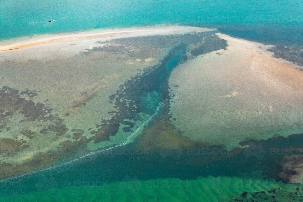 aerial view of sand bars and reefs in water - Australian Stock Image