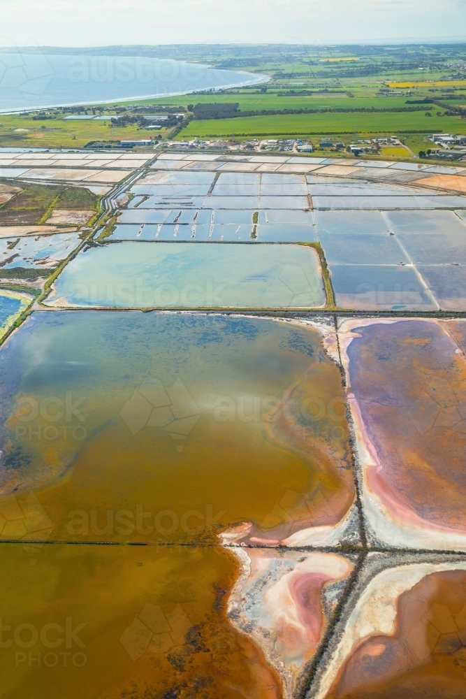 Aerial view of settling ponds on the edge of Corio Bay - Australian Stock Image