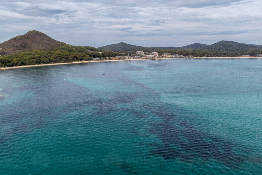 Aerial view of Shoal Bay and Tomaree Mountain in Port Stephens, New South Wales, Australia - Australian Stock Image