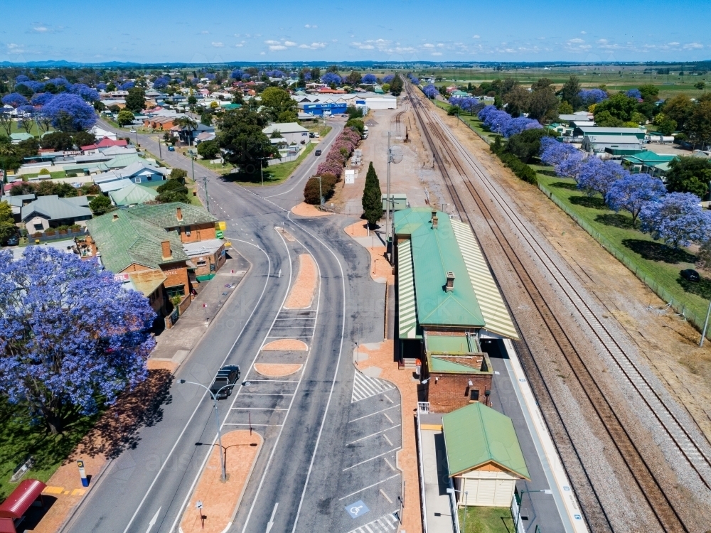 Image of aerial view of singleton train station with empty carparking ...