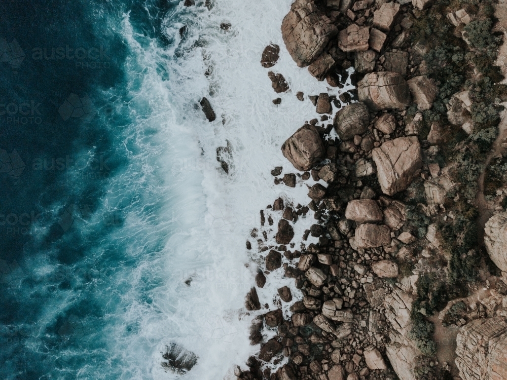 Aerial view of small section of rocky coastline - Australian Stock Image