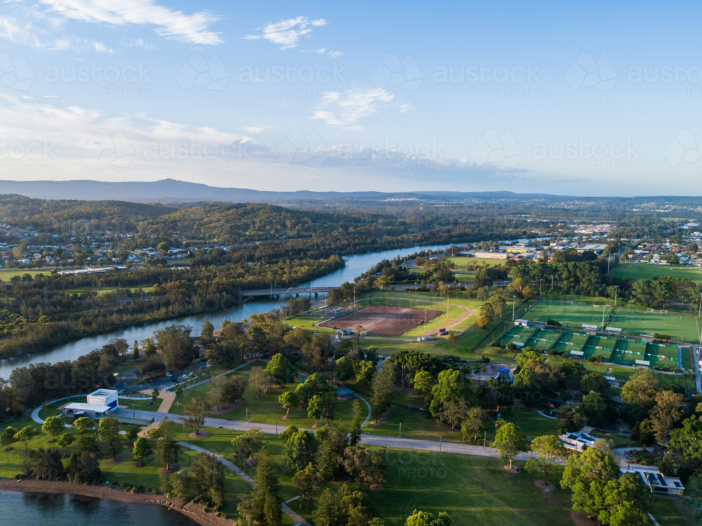Aerial view of speers point park and sports ground to bridge over river on horizon - Australian Stock Image