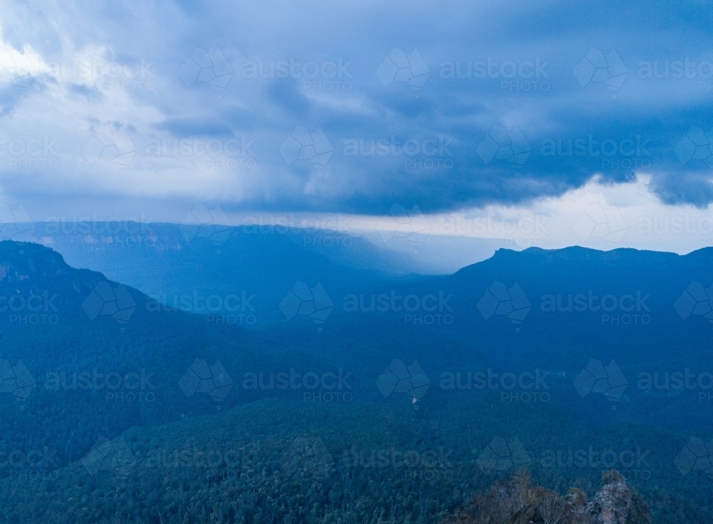 Aerial view of storm clouds approaching over Blue Mountains - Australian Stock Image