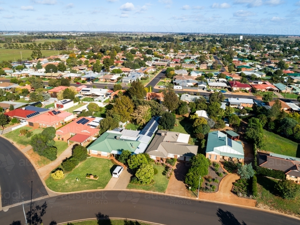 Aerial view of streets and houses in country town of Narromine in NSW on sunlit day - Australian Stock Image