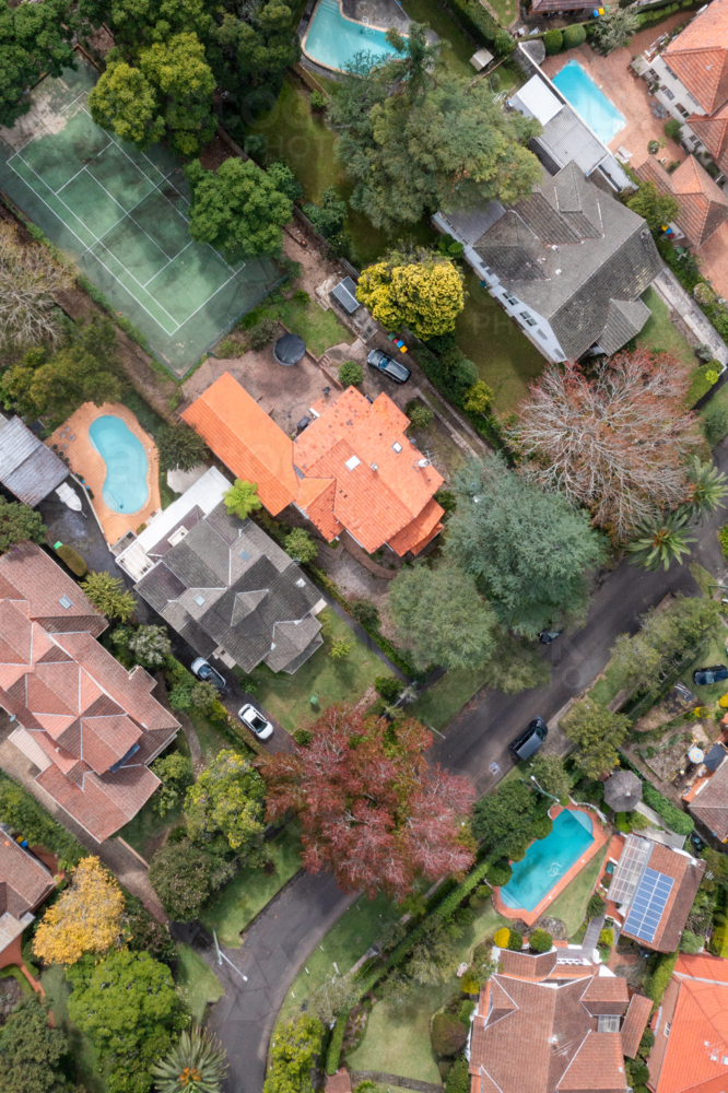 Aerial View of Suburban Neighbourhood with Homes and Green Spaces - Australian Stock Image