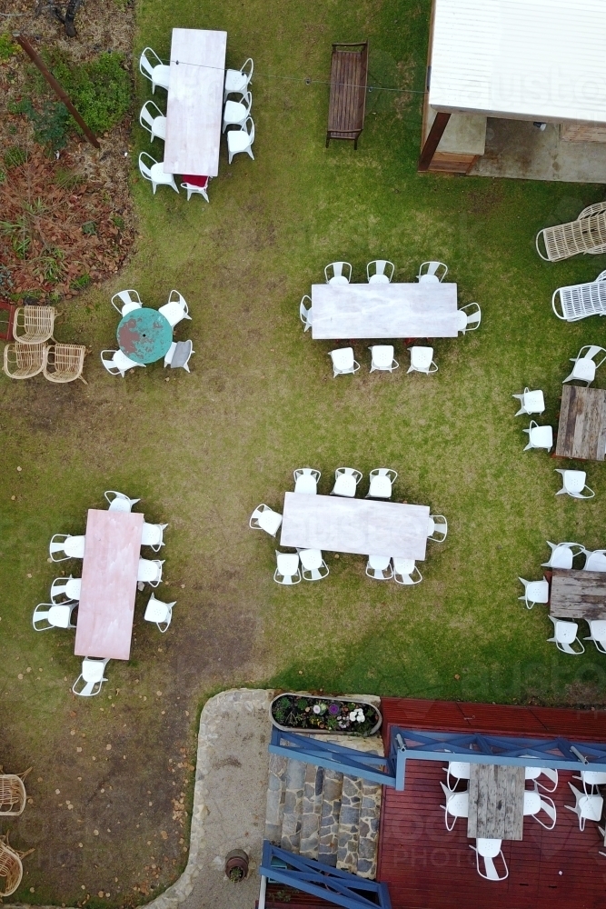 aerial view of tables and chairs on lawn - Australian Stock Image