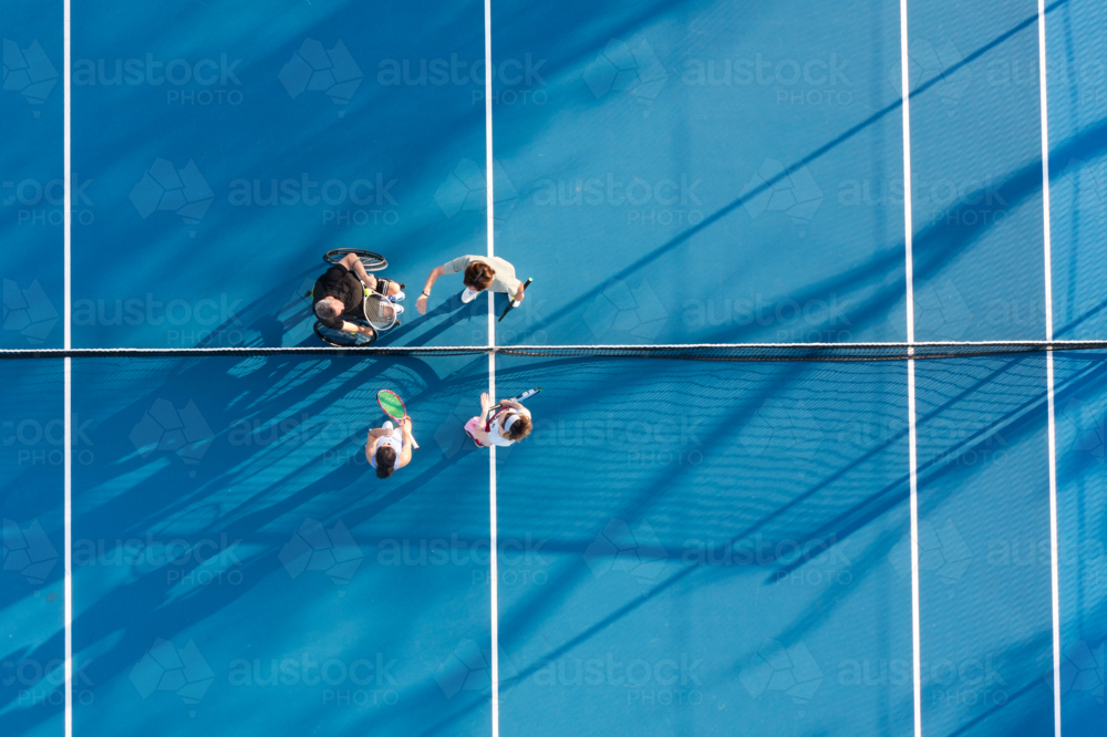 aerial view of tennis court with 4 players - Australian Stock Image