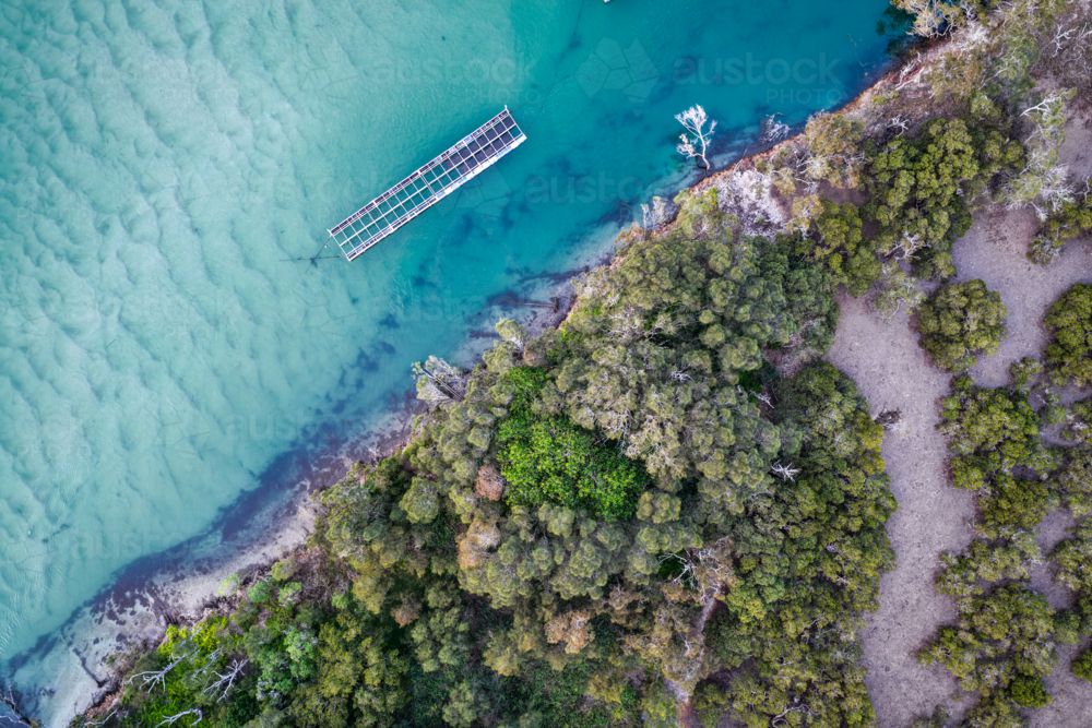 Aerial view of Tern Island in Tuncurry, showcasing its sandy shoreline - Australian Stock Image