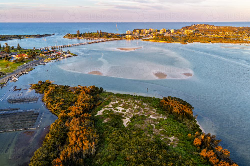 Aerial view of Tern Island in Tuncurry, showcasing its sandy shoreline - Australian Stock Image