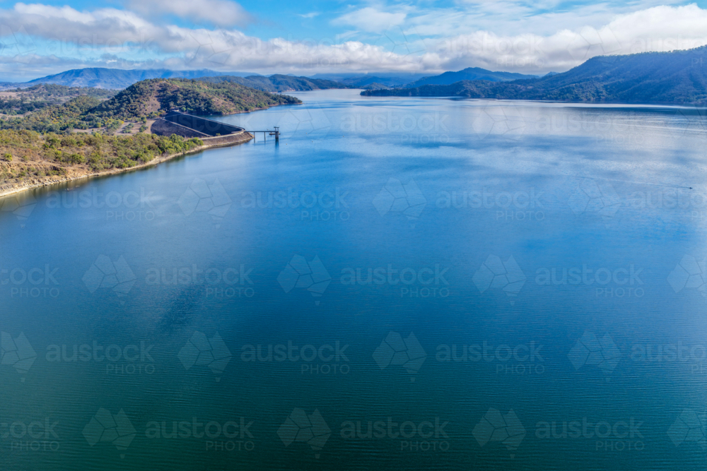 Aerial view of the Glenbawn Dam wall and surrounding landscape showcasing the expanse of the dam - Australian Stock Image