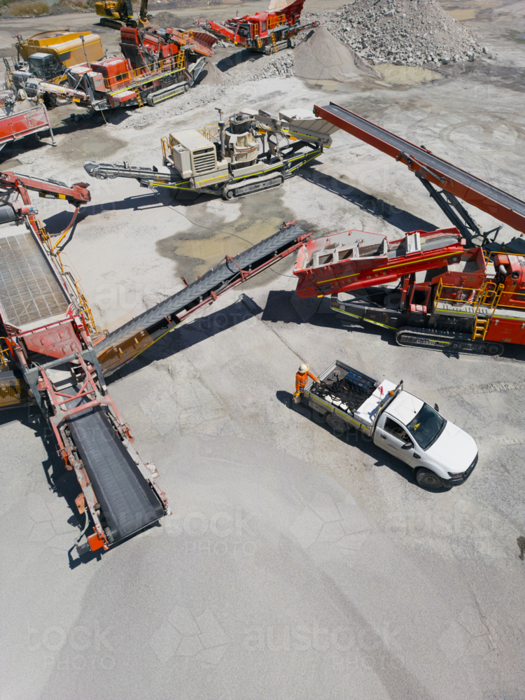 Aerial view of the quarry with machineries. - Australian Stock Image