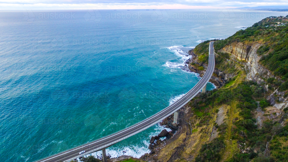 Aerial view of the Sea Cliff Bridge - Grand Pacific Drive on the Illawarra coast. - Australian Stock Image