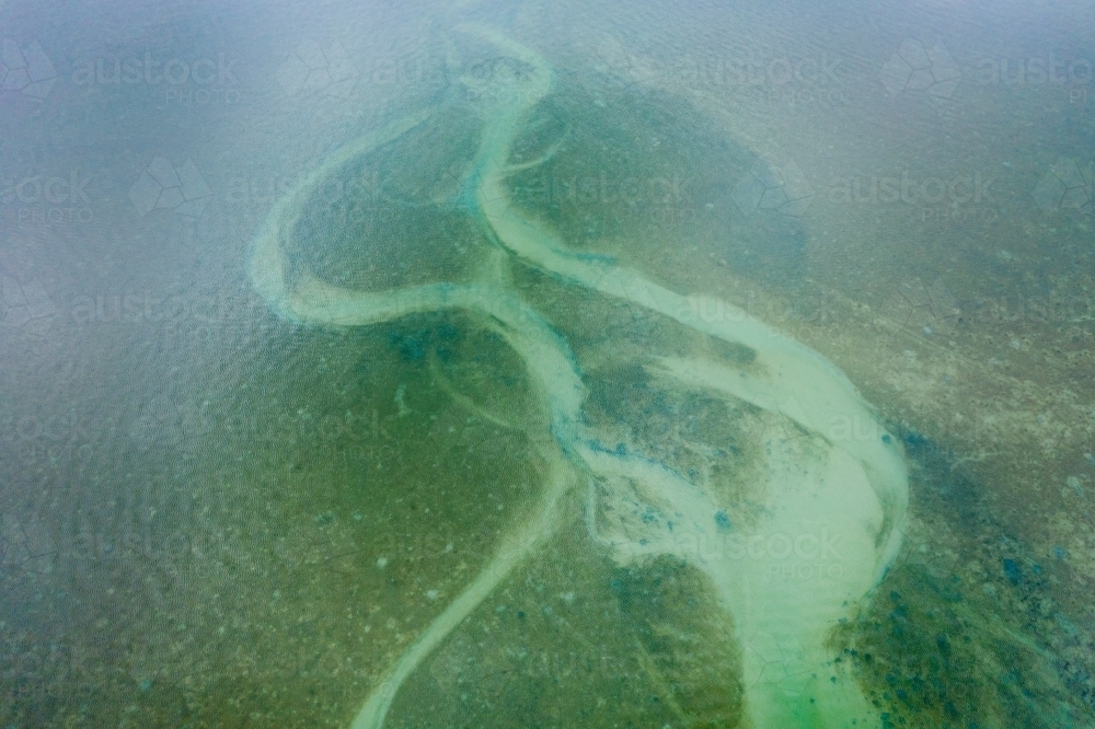 Sandbar Example Image of Aerial view of tidal patterns and sand bars in a coastal ...