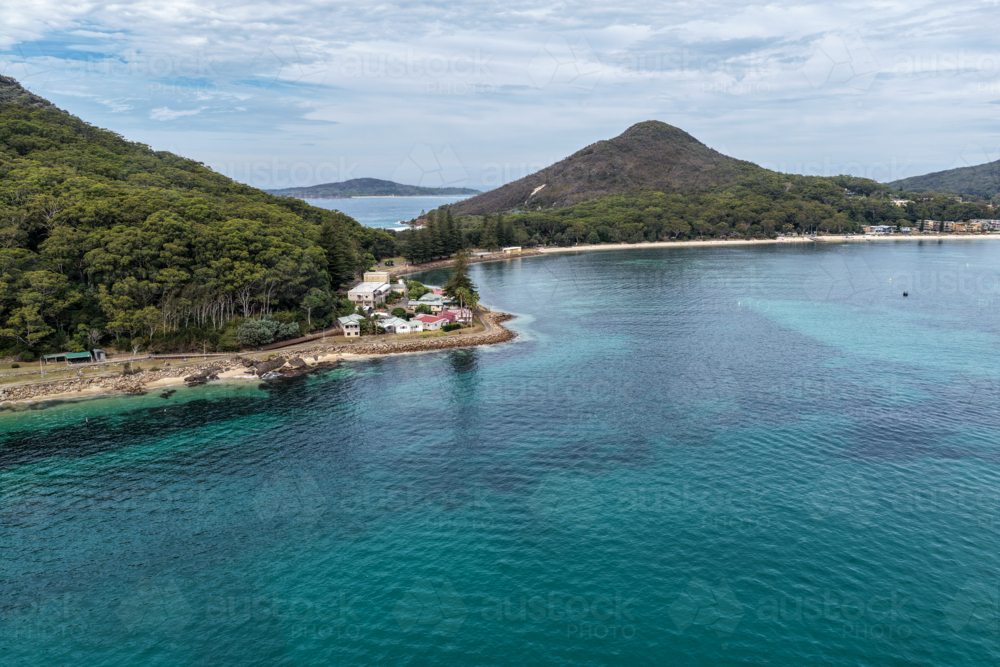 Aerial view of Tomaree Lodge and ocean at Shoal Bay in Port Stephens, New South Wales, Australia. - Australian Stock Image