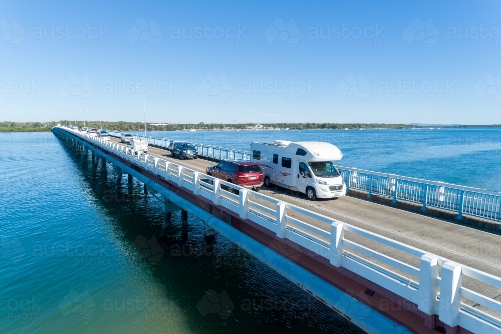Aerial view of vehicles on bridge. - Australian Stock Image