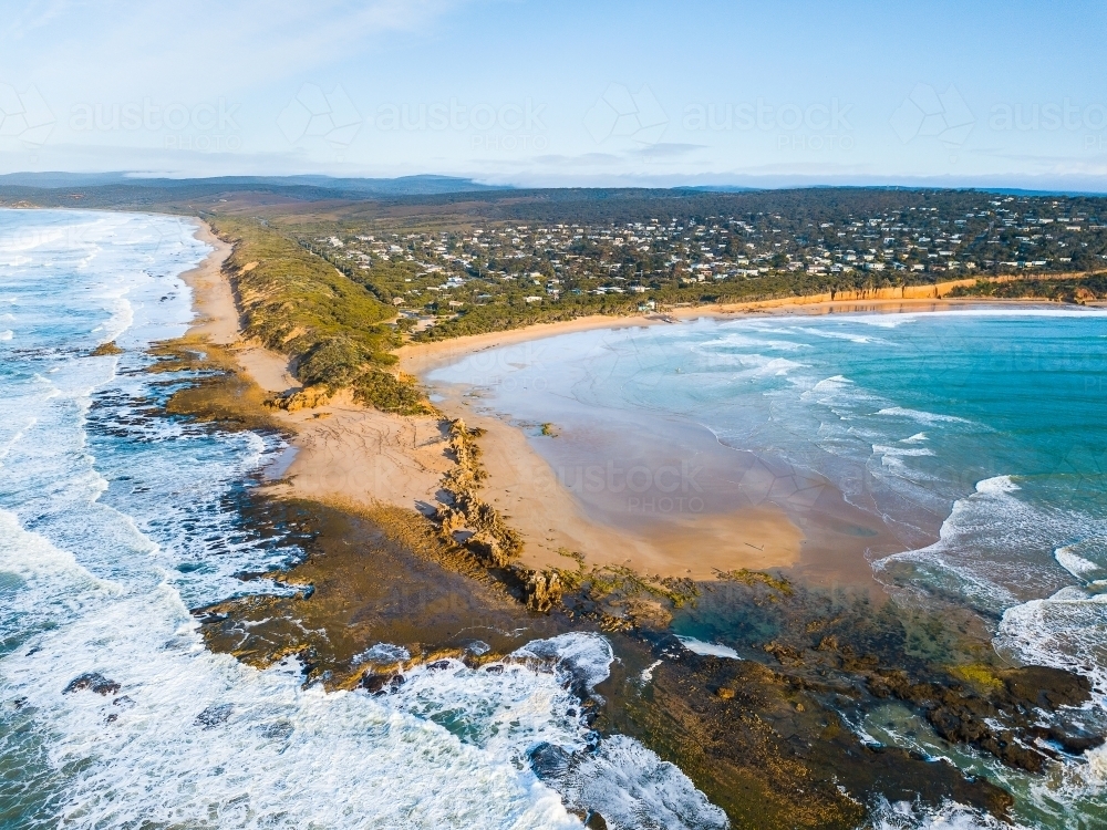 Aerial view of waves breaking around Port Roadknight on the Great Ocean Road - Australian Stock Image