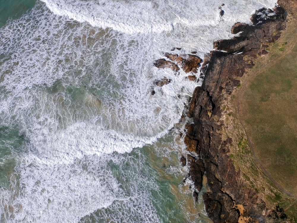 Aerial View of waves rolling in at Moonee Beach - Australian Stock Image