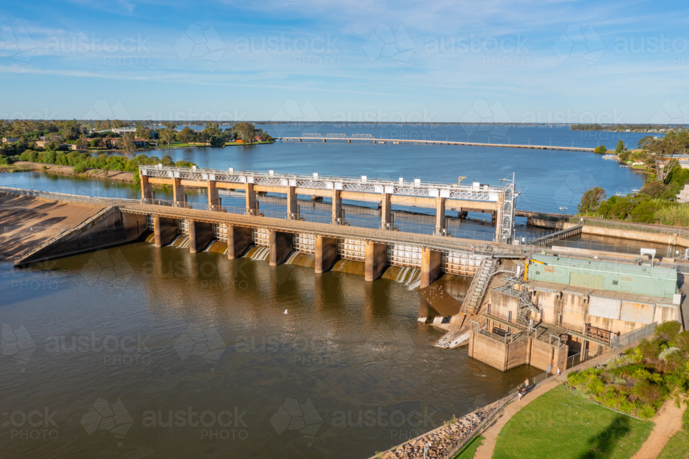 Aerial view of weir on an inland lake - Australian Stock Image