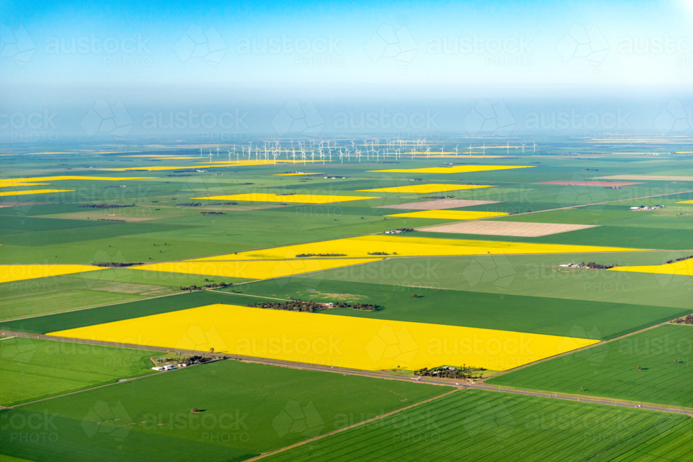 Aerial view of wind turbines and patchwork farmland - Australian Stock Image