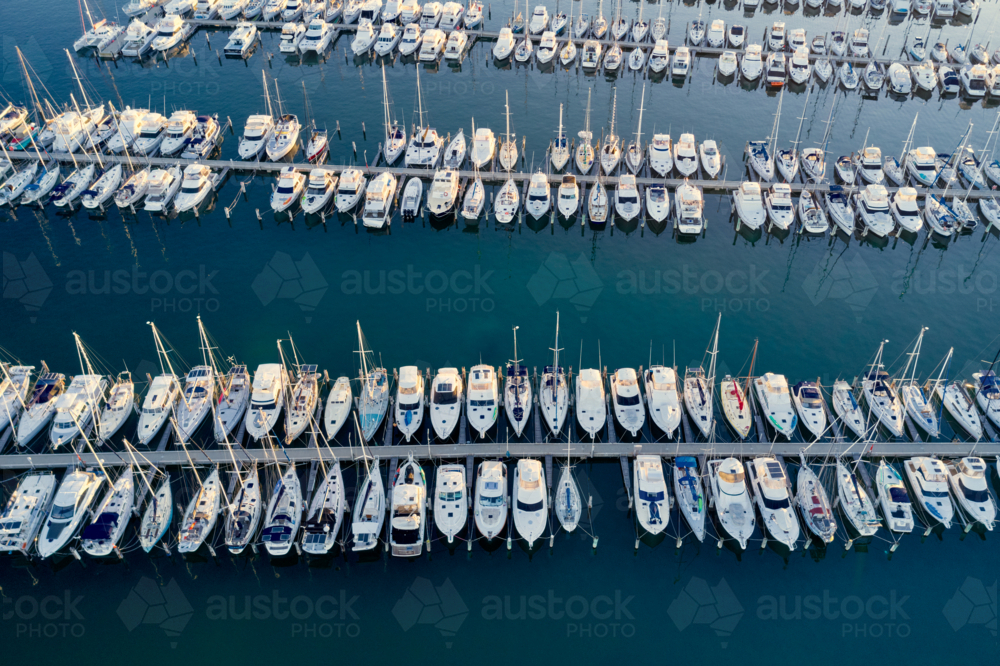 Aerial view of yachts moored in rows in a marina in Fremantle : Austockphoto Aerial view of yachts moored in rows in a marina in Fremantle - Australian Stock Image