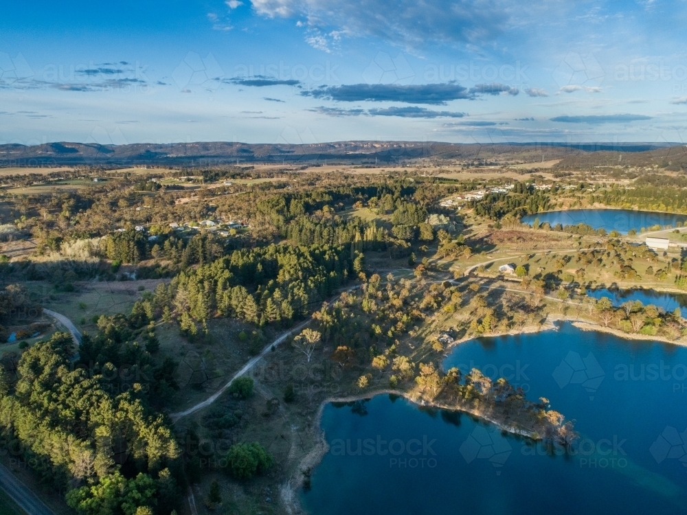 Aerial view over old quarry now a lake in Portland NSW - Australian Stock Image