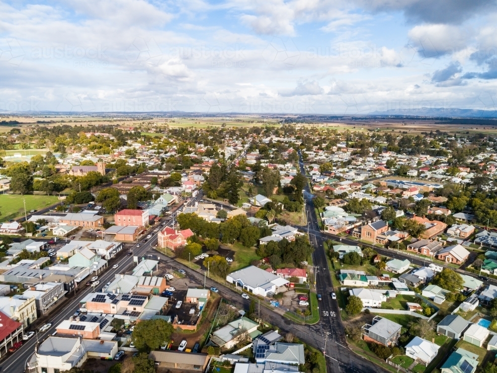 Aerial view over suburbia - streets and homes in country town - Australian Stock Image